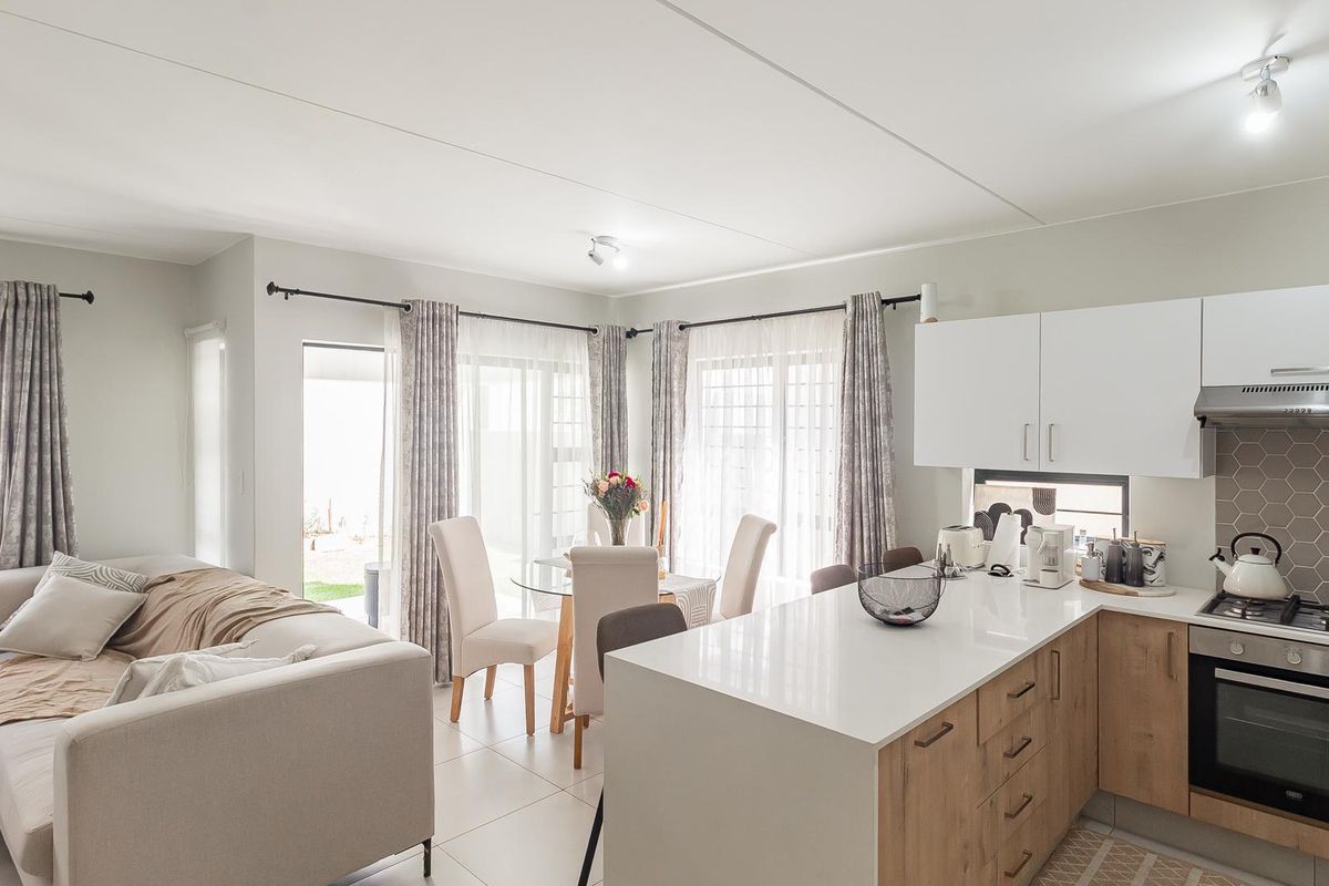 Modern Elegance in a Secure and Sought-After Estate - Photo 2