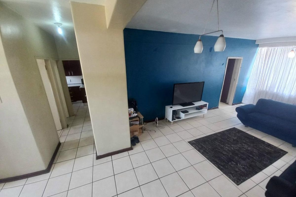 Your Perfect Haven: 2 Bedrooms, Cozy Living Space, Modern Kitchen, and Secure Comfort - Photo 4