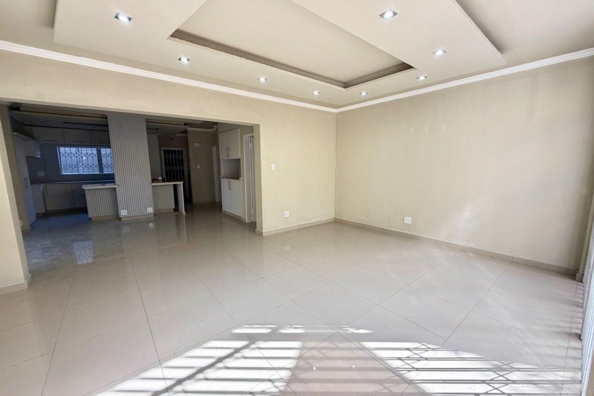 Discover Modern Comfort in This Renovated Duplex Townhouse! - Photo 3