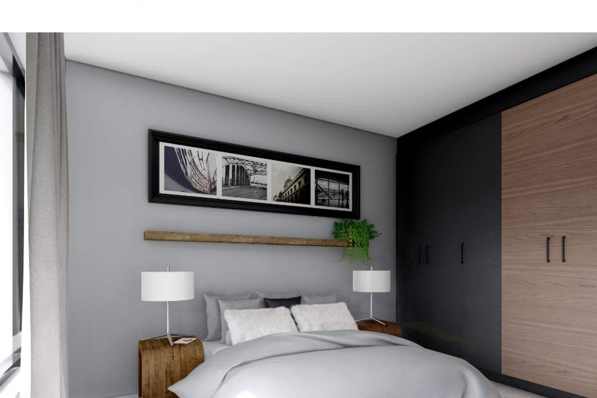 A modern bedroom featuring sleek built-in cupboards with a wood and dark finish, presented as a promotional image for Crown Oak Estate.