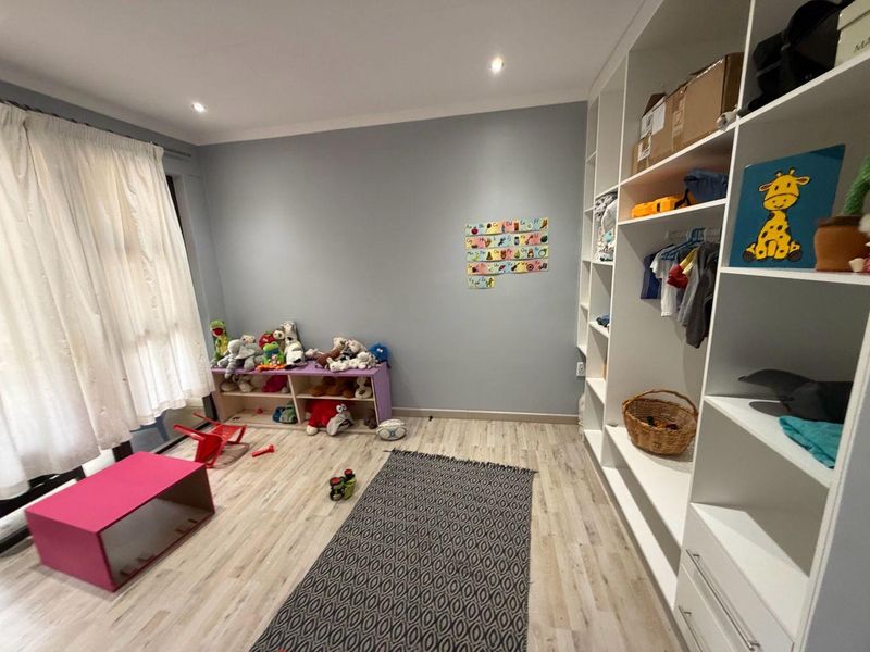 Charming 4-Bedroom Home: Style Meets Comfort - Photo 9