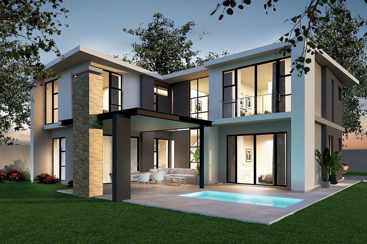 Modern double-story cluster home featuring a rear patio, swimming pool, stone-clad architectural detailing, and large glass sliding doors opening to the garden.