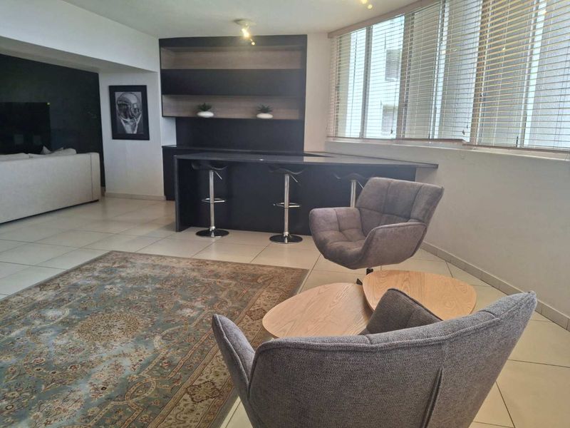A BEAUTIFULLY FURNISHED THREE BEDROOM APARTMENT - Photo 4