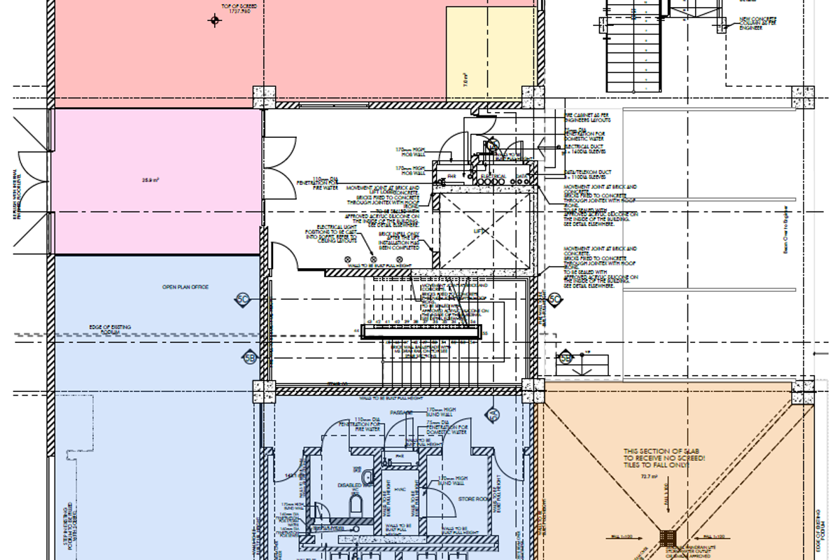 Architectural floor plan detailing the layout of the office space, including ablution facilities, lift access, staircase, and open-plan office areas.