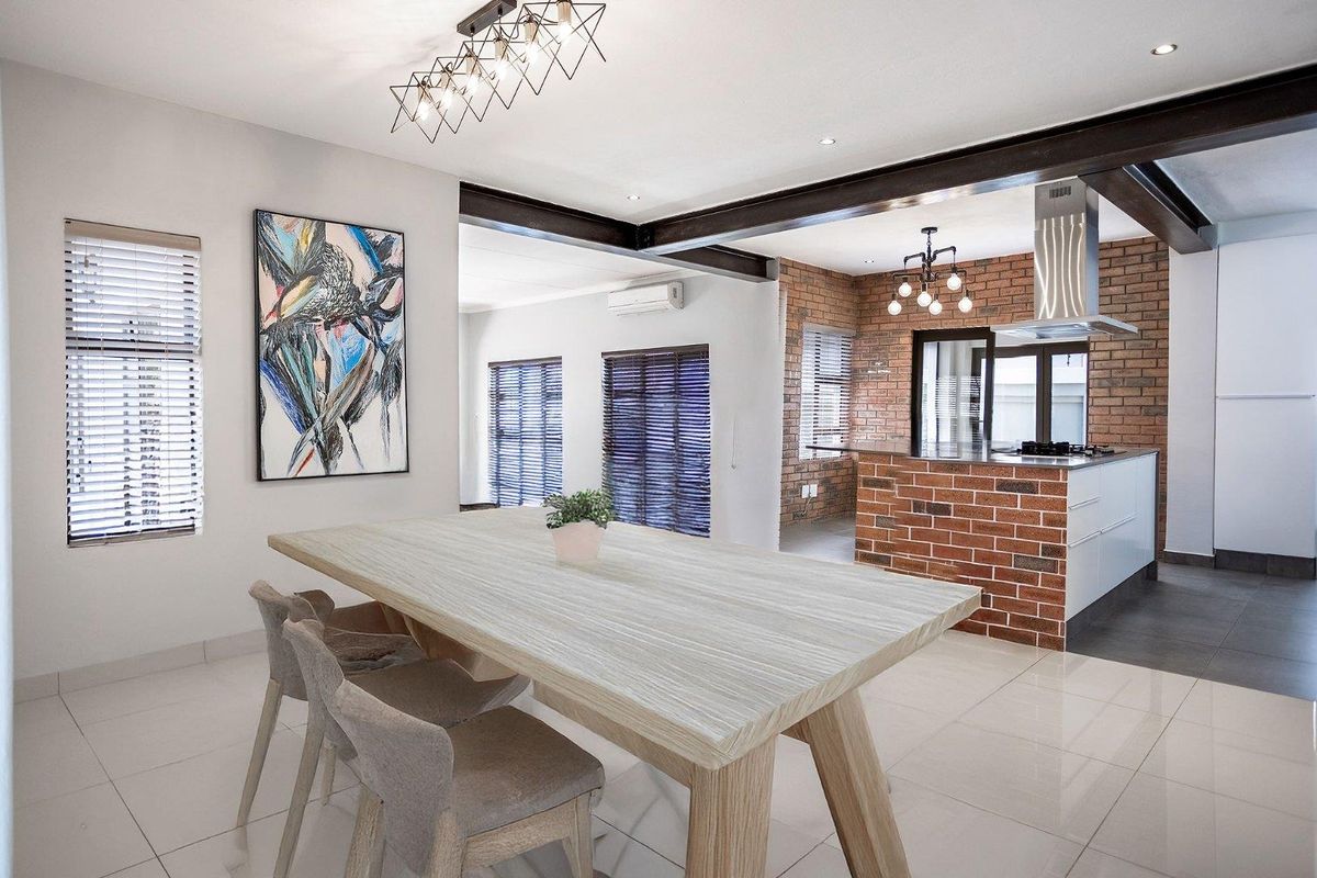 Luxury Modern Renovation in Sought-After Security Estate - Photo 5