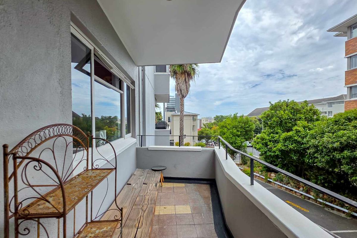 North east facing corner apartment with two balconies and automated garage | Sea Point - Photo 3