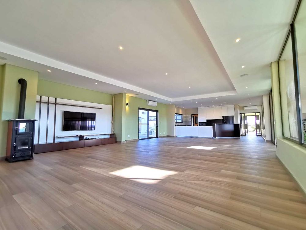 MAIN DWELLING OPEN-PLAN KITCHEN WITH LOUNGE 