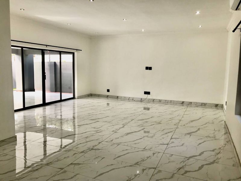 Spacious 4-Bedroom Home to Let - Photo 7