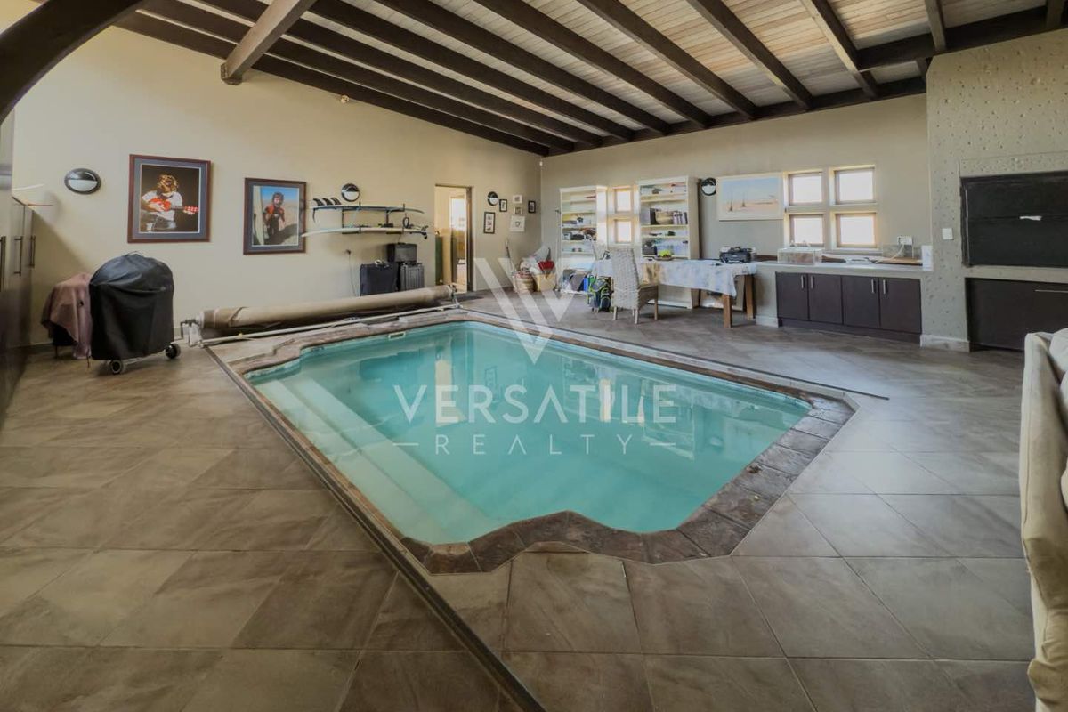 Luxury Beachfront Living – Exceptional 4 Bedroom Home with Unmatched Views - Photo 4