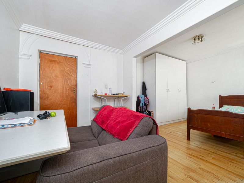 This Versatile Double-Storey property offers the perfect opportunity for renovation and customization with independent Upper and Lower Living (Homes) - Photo 4