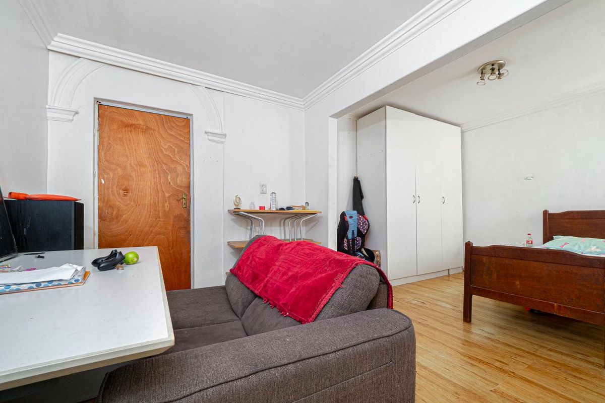 This Versatile Double-Storey property offers the perfect opportunity for renovation and customization with independent Upper and Lower Living (Homes) - Photo 4