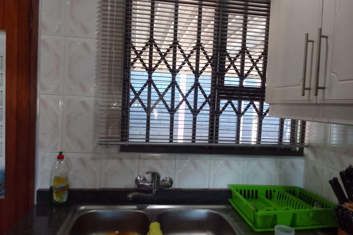 Cozy 3-Bedroom Home with Carport, Satellite Dish, and Comfortable Living Spaces - Photo 3