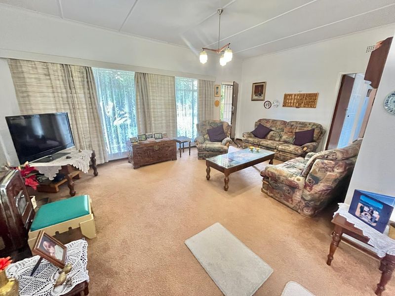 This charming three-bedroom home is ideally situated just a short walk from ElspHigh school - Photo 4