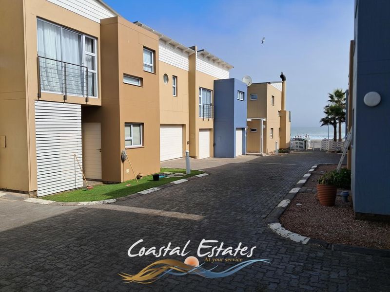 Stunning Waterfront Townhouse Just Steps from the Ocean - Photo 1