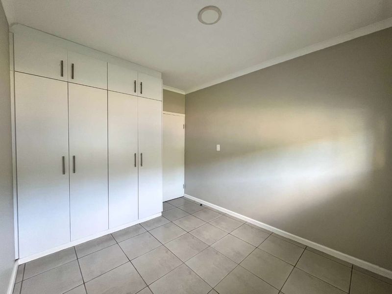 Stylish 1-Bed Garden Apartment in Sought-After The Woods Estate - Photo 9