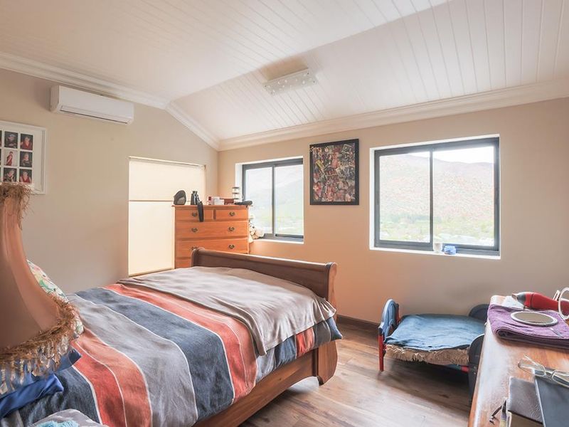Stunning Family Home with Panoramic Mountain Views and Income-Generating Cottage - Photo 8