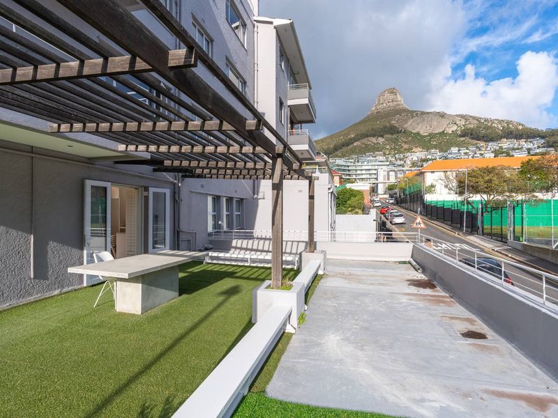 Spacious 2-Bedroom with Wrap-Around Terrace in Prime Location - Photo 1