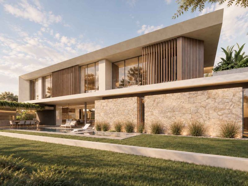 Modern luxury residence featuring a swimming pool, stone-clad facade, timber architectural detailing, and expansive floor-to-ceiling glass overlooking a landscaped garden.