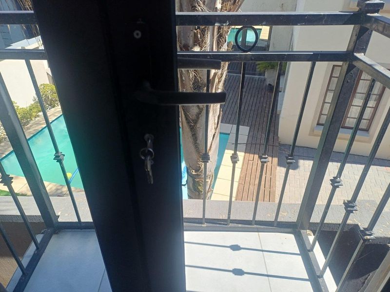 Stylish Double-Storey Cluster with Granny Flat & Poolside Charm - Photo 6