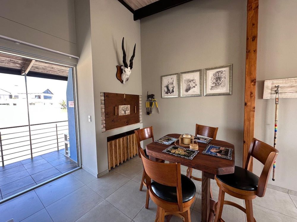 Main Flat, 2 ensuite bedrooms, open plan kitchen with lounge and inside barbecue and balcony.