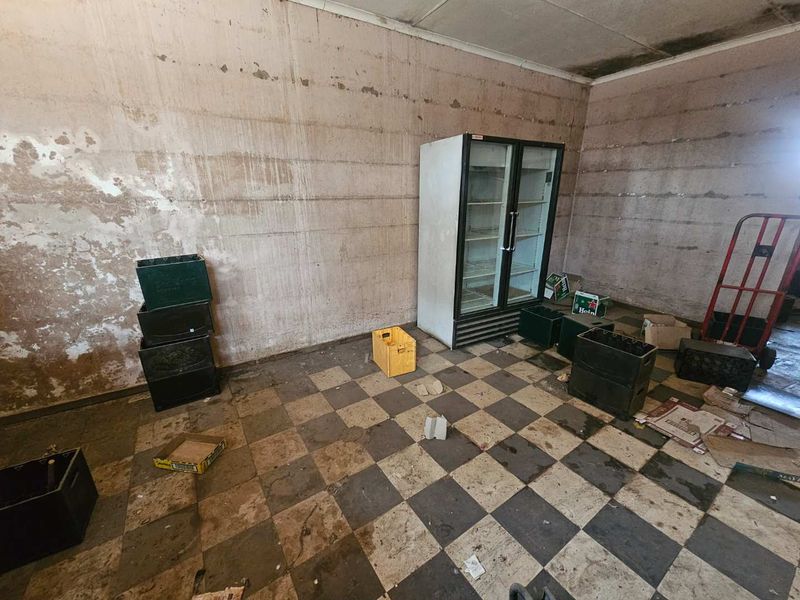 Versatile Commercial Property with Retail and Warehouse Buildings and Cold Storage - Photo 6