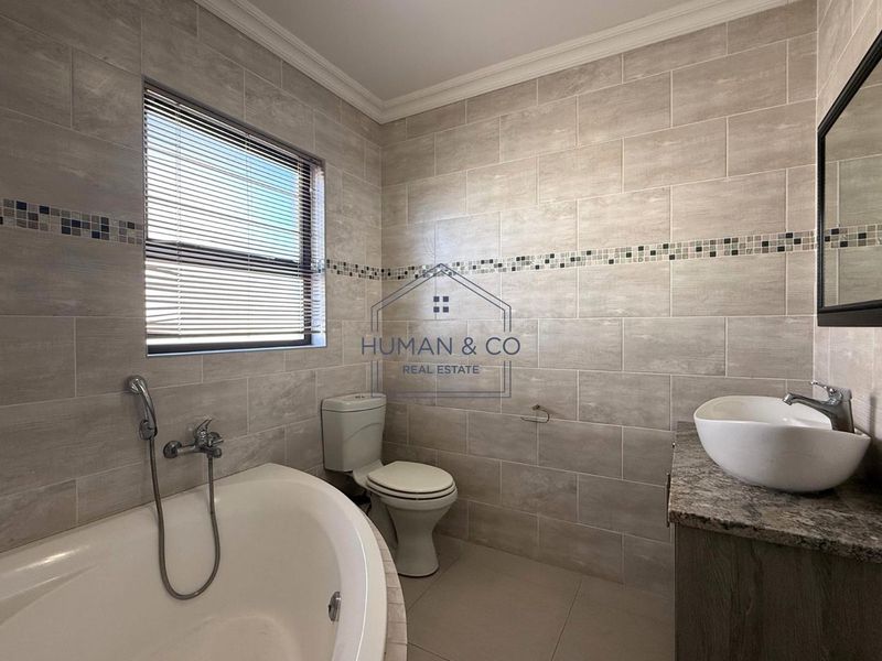 Modern 4-bedroom Home in Fairway Estate - Photo 10