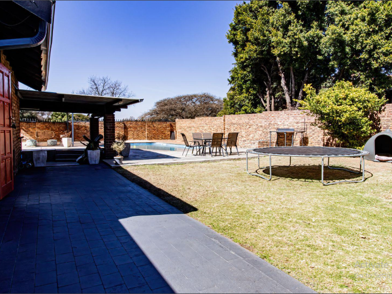 Entertain in Style: Covered Braai with a Pool in This Stunning Home - Photo 6