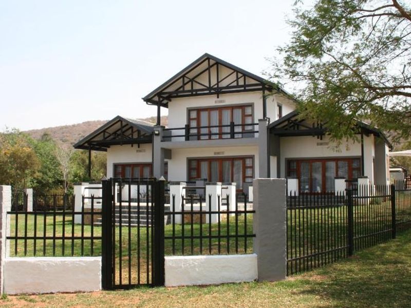 STUNNING 167 HECTARE GAME FARM AND LODGE FOR SALE NEAR BRITS - Photo 7