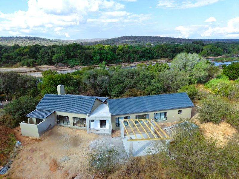 Brand-New 3-Bedroom Riverfront Home – Elephant Rock Eco Estate - Photo 6