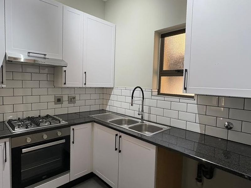 STUPENDOUS FULLY RENOVATED 2 BED 1 BATH GROUND FLOOR  APARTMENT IN THE FANTASTIC COMPLEX IN LONEHILL , FOURWAYS - Photo 9