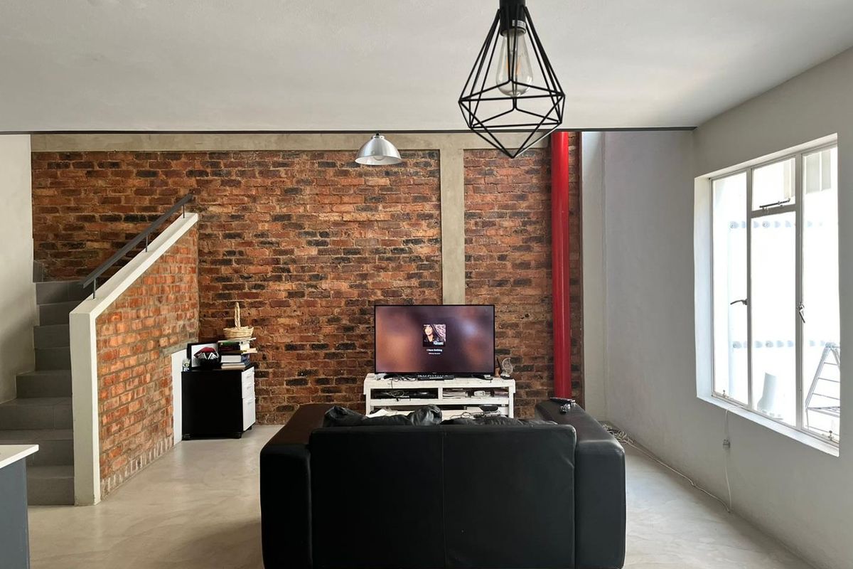 Charming Loft Living: Modern Comfort in a Secure Complex! - Photo 4