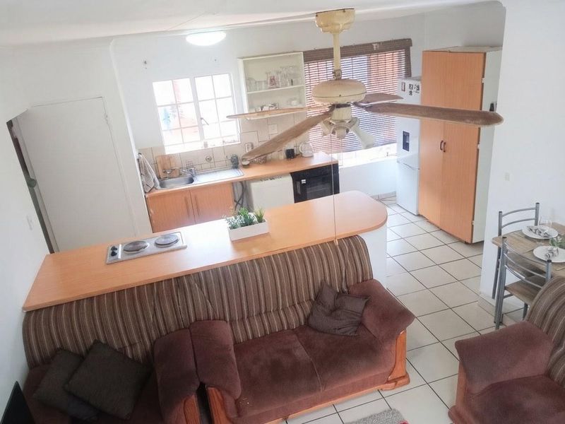 Exceptionally Secure Two-Bedroom Townhouse with Private Garden Retreat - Photo 7