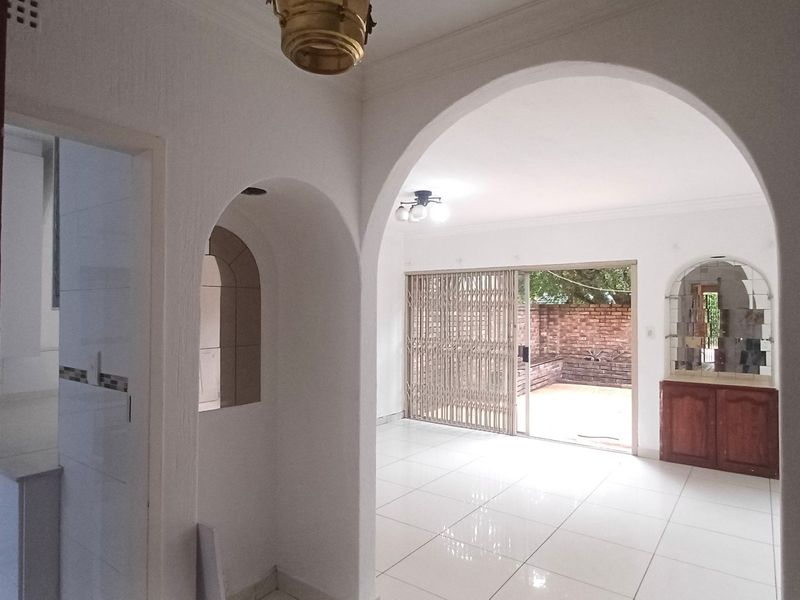 Spacious, Affordable Double-Storey Living with Patio & Pool - Photo 2