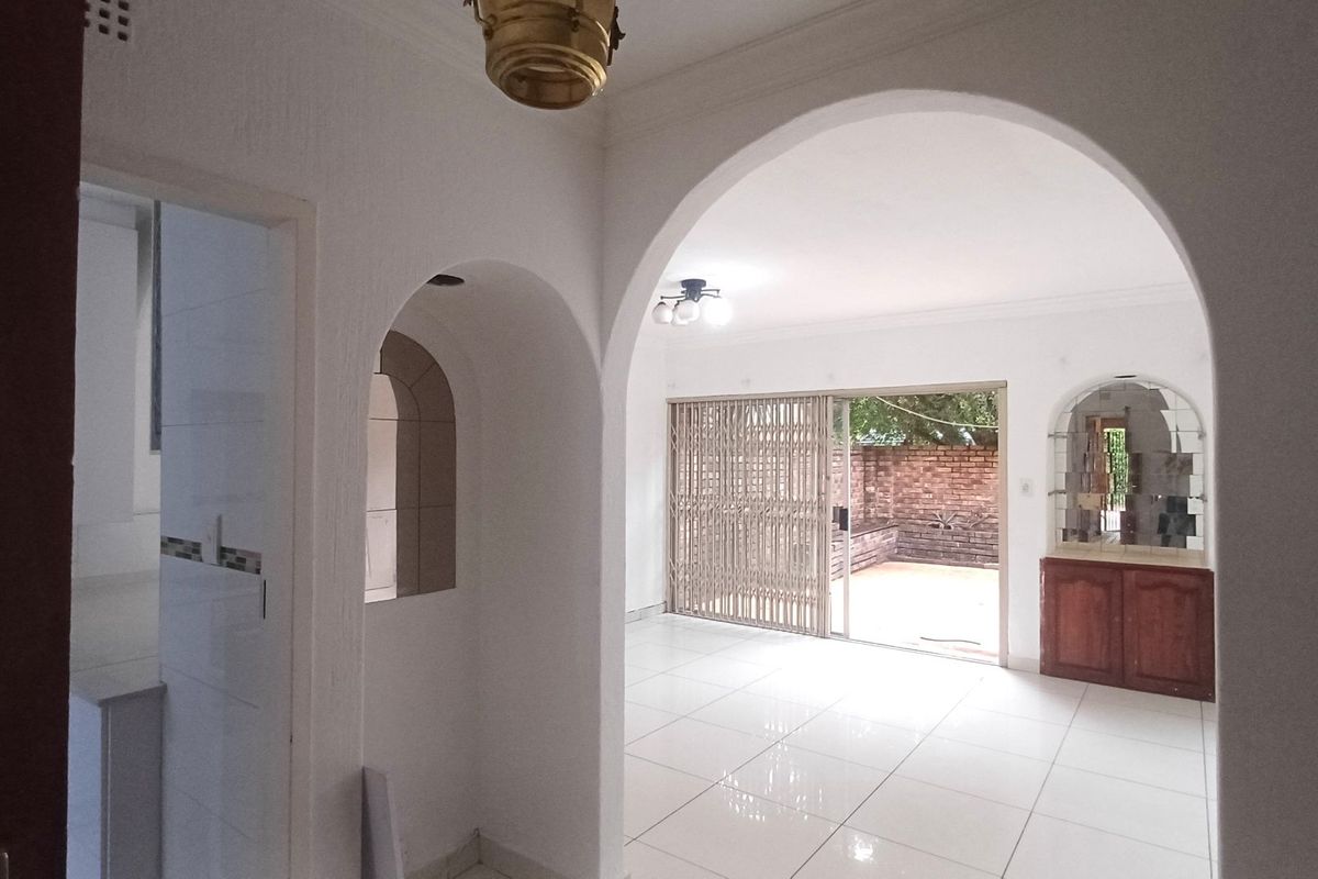 Spacious, Affordable Double-Storey Living with Patio & Pool - Photo 2