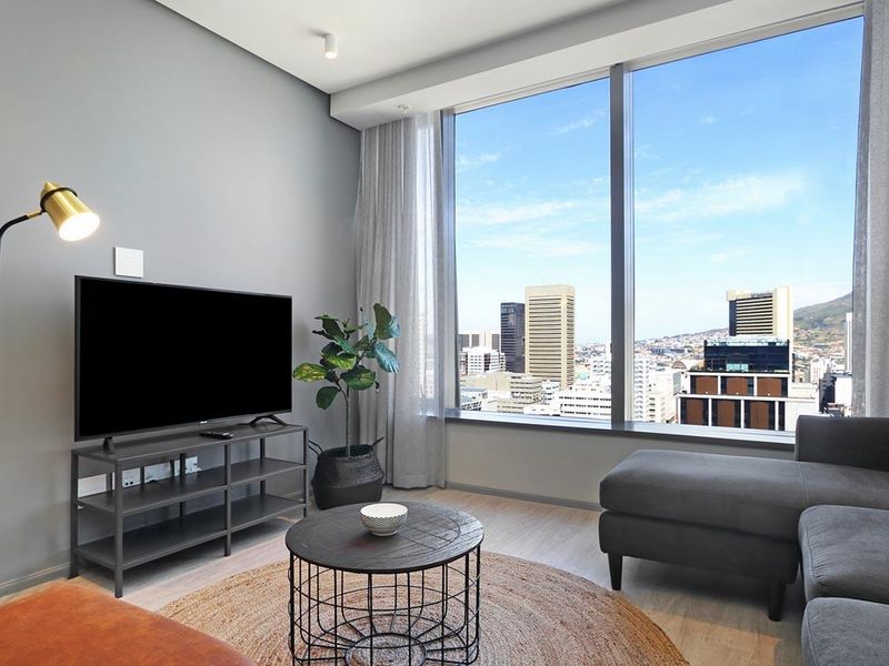 Experience City Living with a Serene Mountain Backdrop - Photo 2