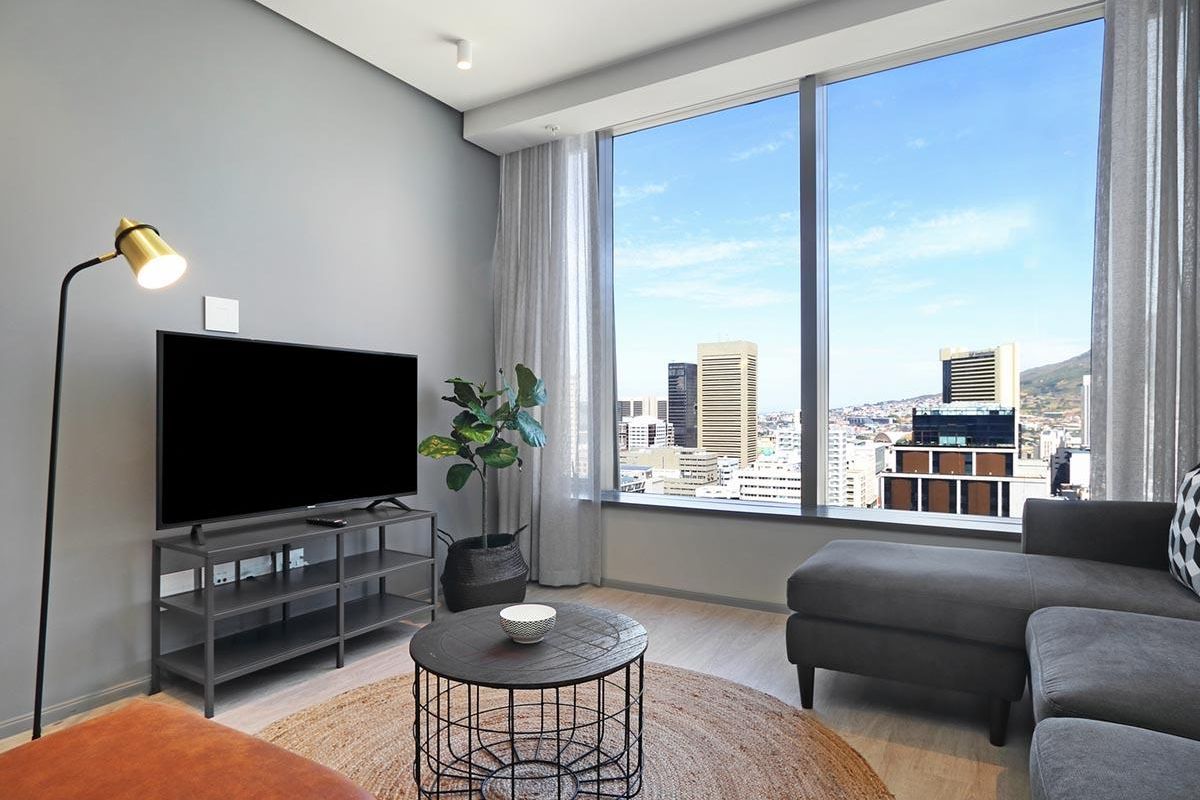 Experience City Living with a Serene Mountain Backdrop - Photo 2