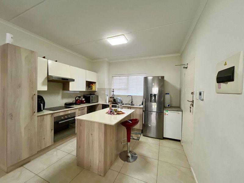 Live in Style at Orchid Ridge: Ground-Floor Delight! - Photo 3