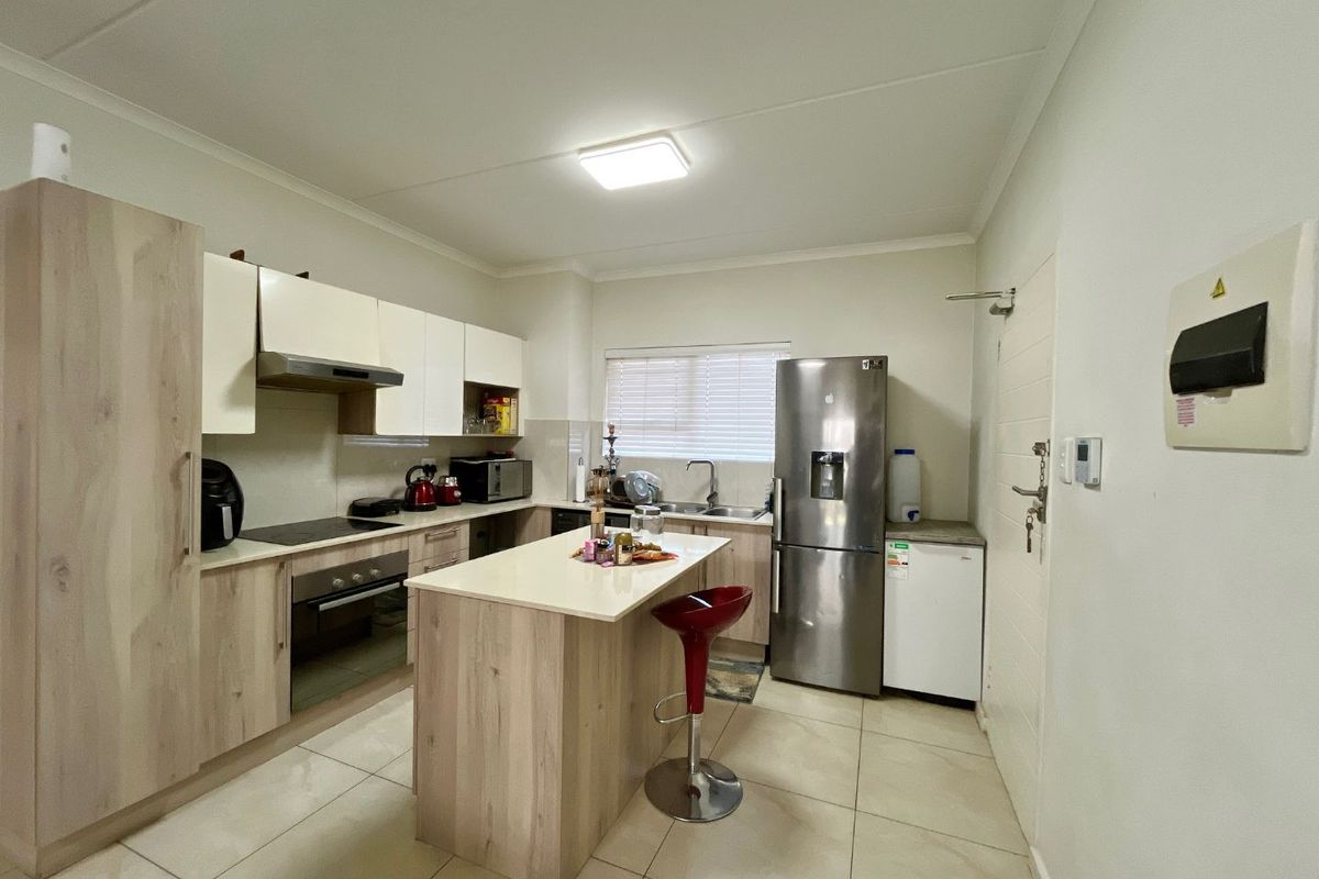 Live in Style at Orchid Ridge: Ground-Floor Delight! - Photo 3