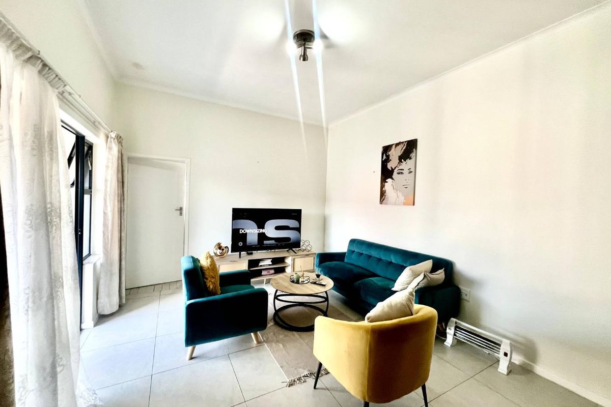 Modern Elegance: 1-Bedroom Gem with Balcony & Braai - Photo 4