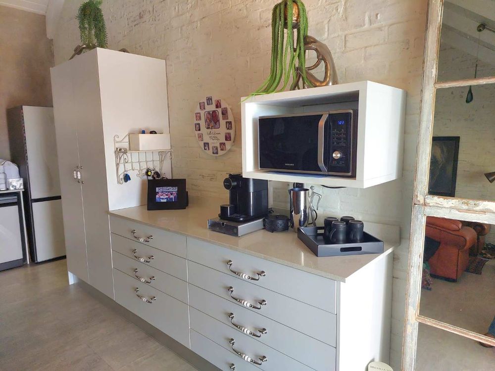 Kitchen cupboards and coffee station