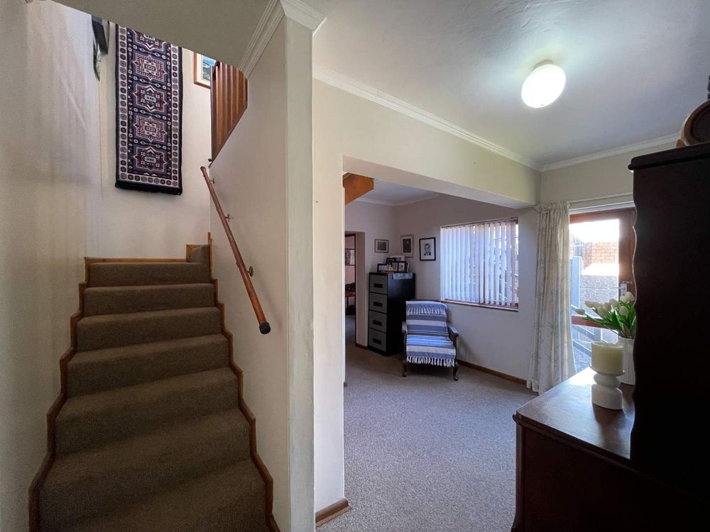 Front door entrance to spacious landing, ground floor with 3 Bedrooms, 1 bathroom and 1 guest toilet - stairs lead to upstairs living area