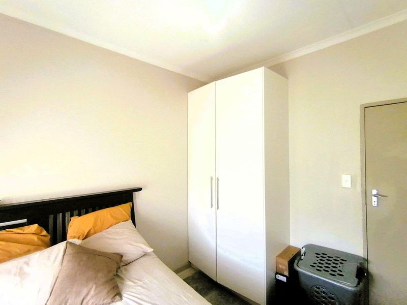 Charming 2-bedroom Cluster House - Photo 10