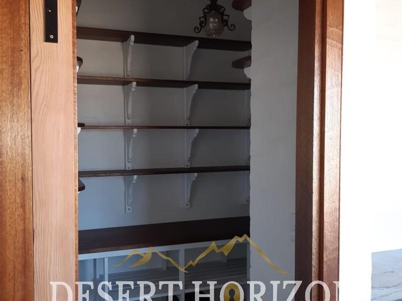 Erongo , Rossmund | Charming Double-Storey Home with Modern Amenities and Scenic Surroundings - Photo 7