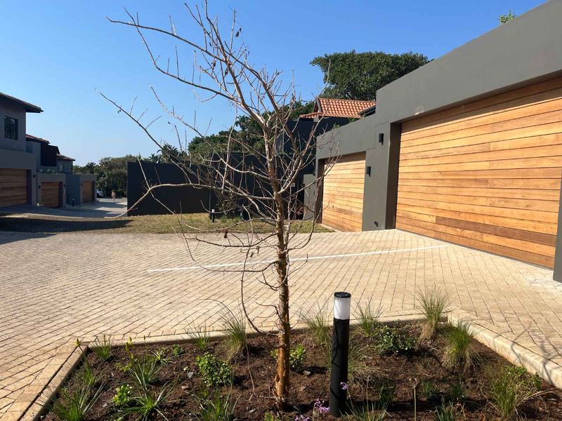 Experience luxury coastal living in this modern 3-bedroom duplex villa at the prestigious Zimbali - Photo 5