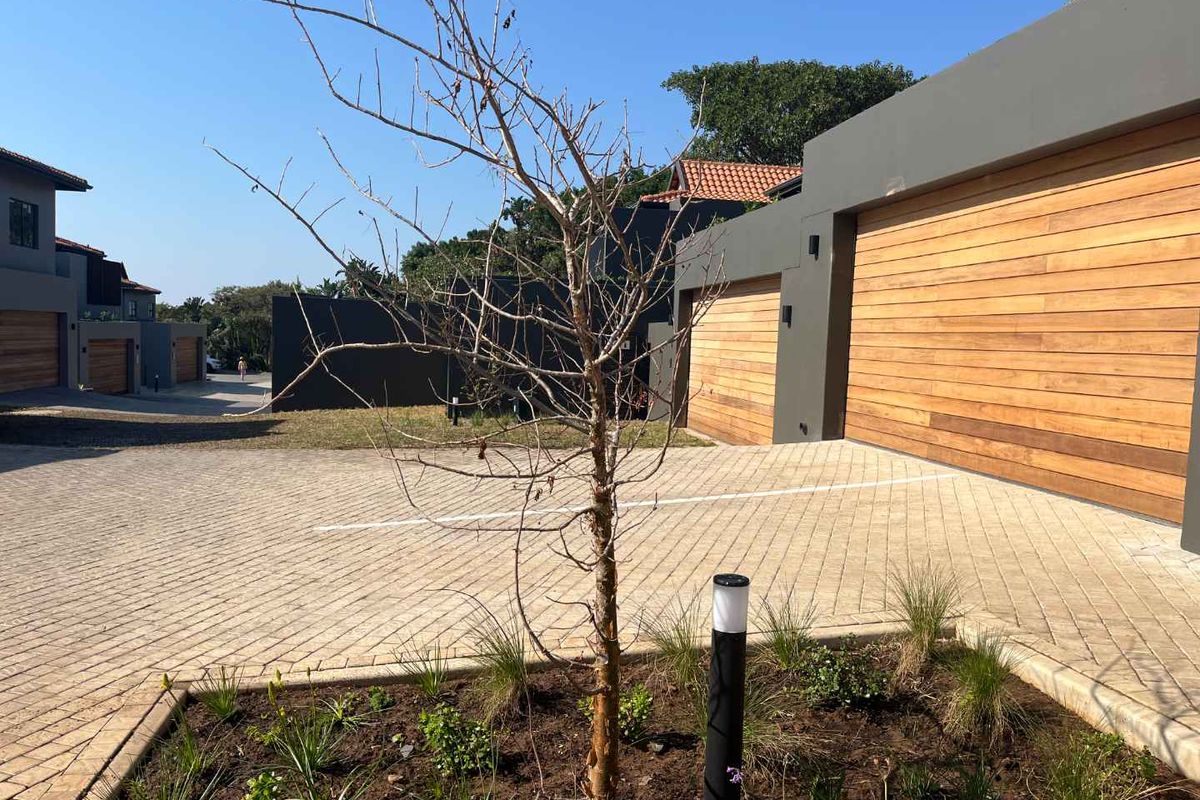 Experience luxury coastal living in this modern 3-bedroom duplex villa at the prestigious Zimbali - Photo 5