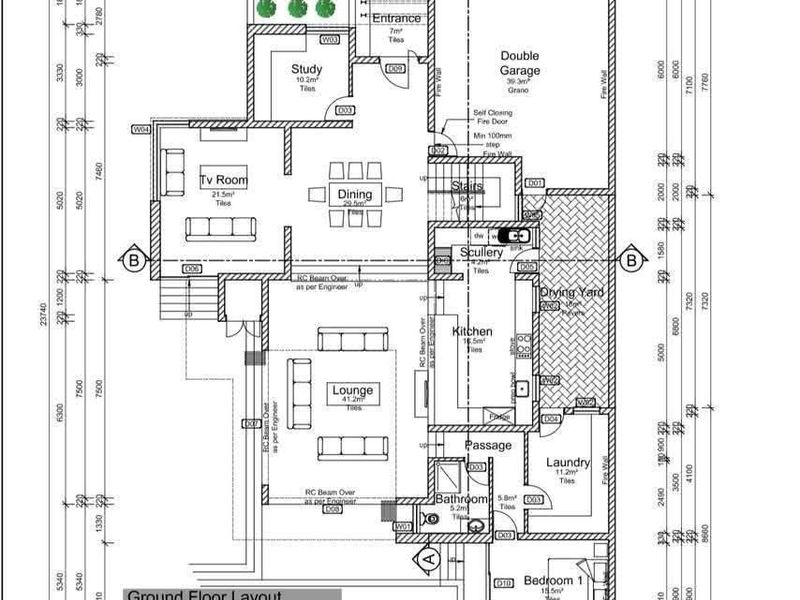 Architectural ground floor layout plan detailing the spatial arrangement of the living areas, kitchen, bedrooms, and garage.