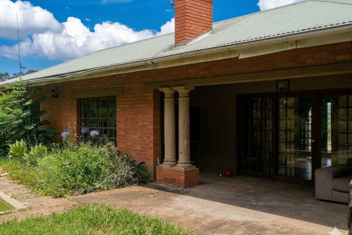 Level Smallholding with 4 Bedroom Home and Cottage | Renovation Opportunity with Endless Potential - Photo 2