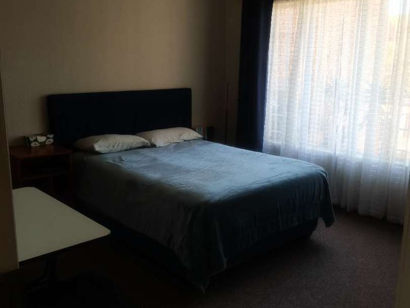 Cozy 2-Bedroom First-Floor Unit with Spacious Living - Photo 10