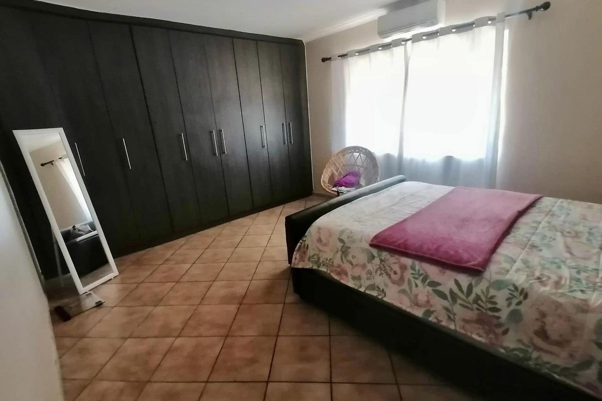 This charming 3-bedroom home offers spacious living areas, a modern kitchen, and a cozy backyard perfect for relaxation. - Photo 5