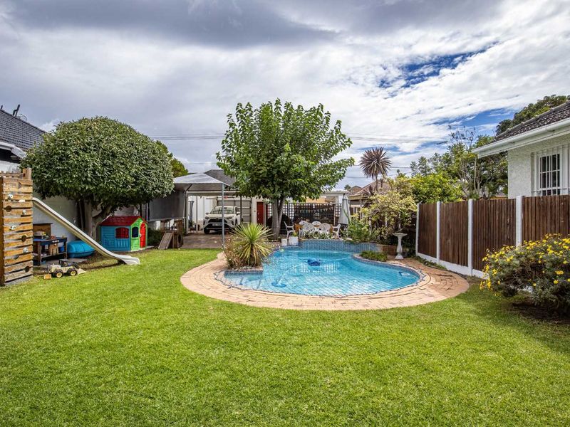 Charming North-Facing Double-Storey Home with Sunny Garden & Pool - Photo 6